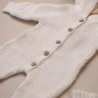 white_knit_bunny_romper_buttons_detail