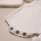 white_knit_romper_detail