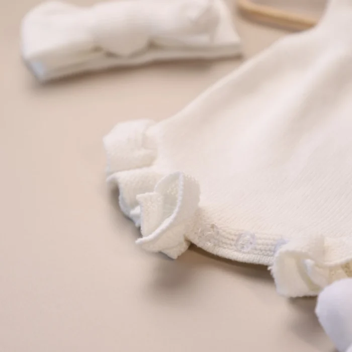 white_knit_ruffle_romper_detail white_knit_ruffle_romper_detail