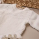 white_knit_ruffle_top_detail